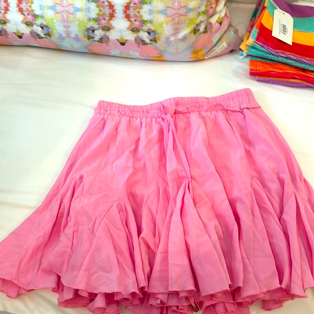 Pink flow skirt with shorts underneath